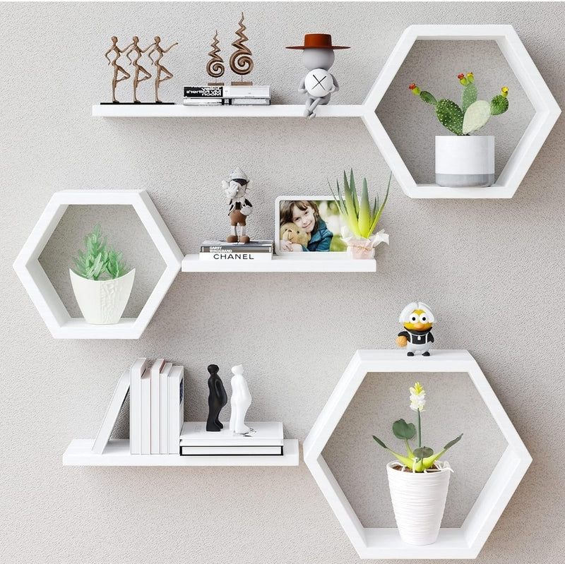 Hexagonal shelves with decorative items on a gray wall